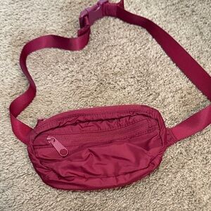 Pink small maroon belt bag